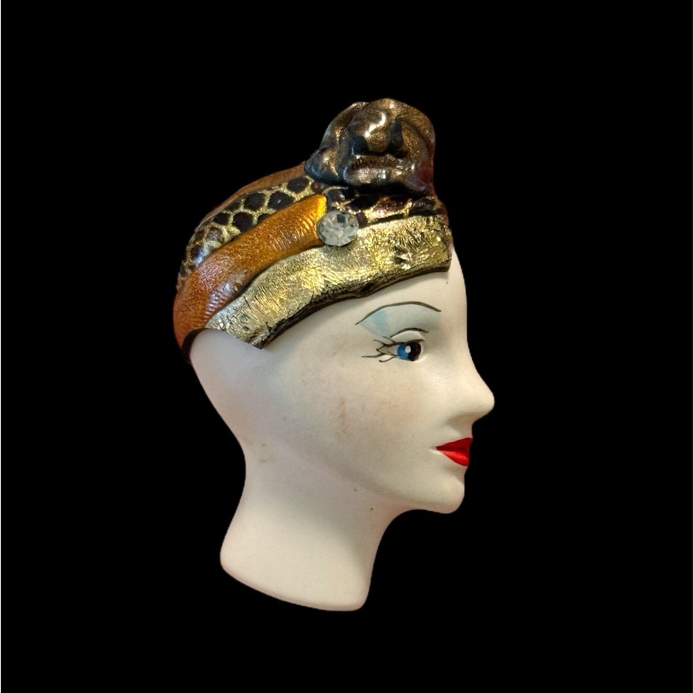 Vintage artisan made brooch featuring the profile of an art deco lady